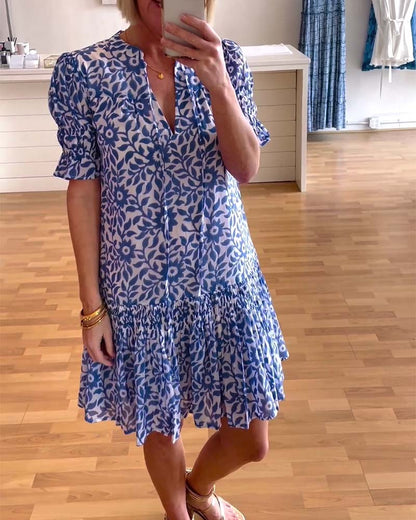 Women's floral mini dress with V-neck, puff sleeves and tiered skirt