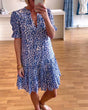 Women's floral mini dress with V-neck, puff sleeves and tiered skirt