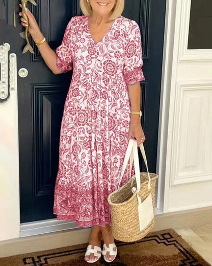 Women's floral V-neck midi dress with three-quarter sleeves