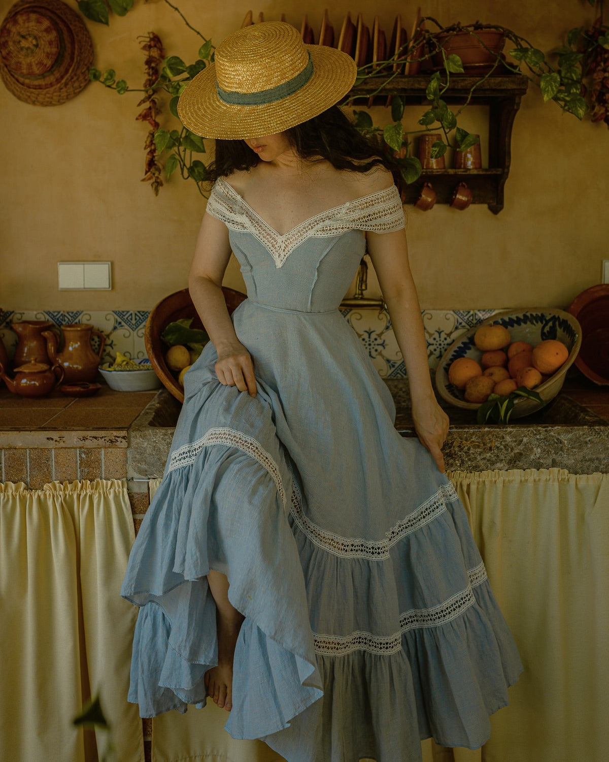 Women's lace-trimmed flared maxi dress with a tiered skirt