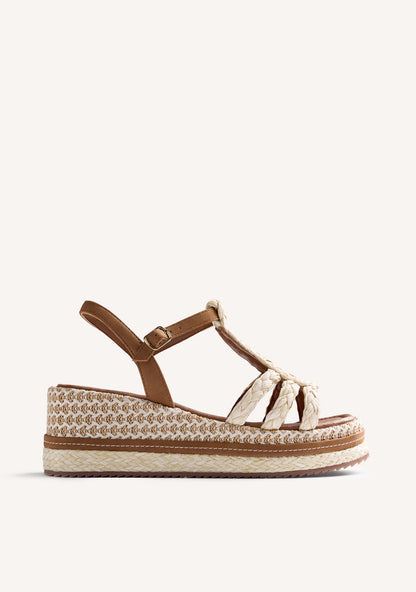 Women's brown wedge sandals with braided straps and ankle buckle