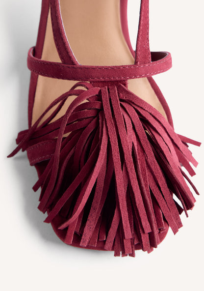 Women's burgundy high-heeled sandals with long fringe front and buckle ankle straps