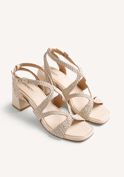 Cream woven heeled sandals with ankle buckle and square toe