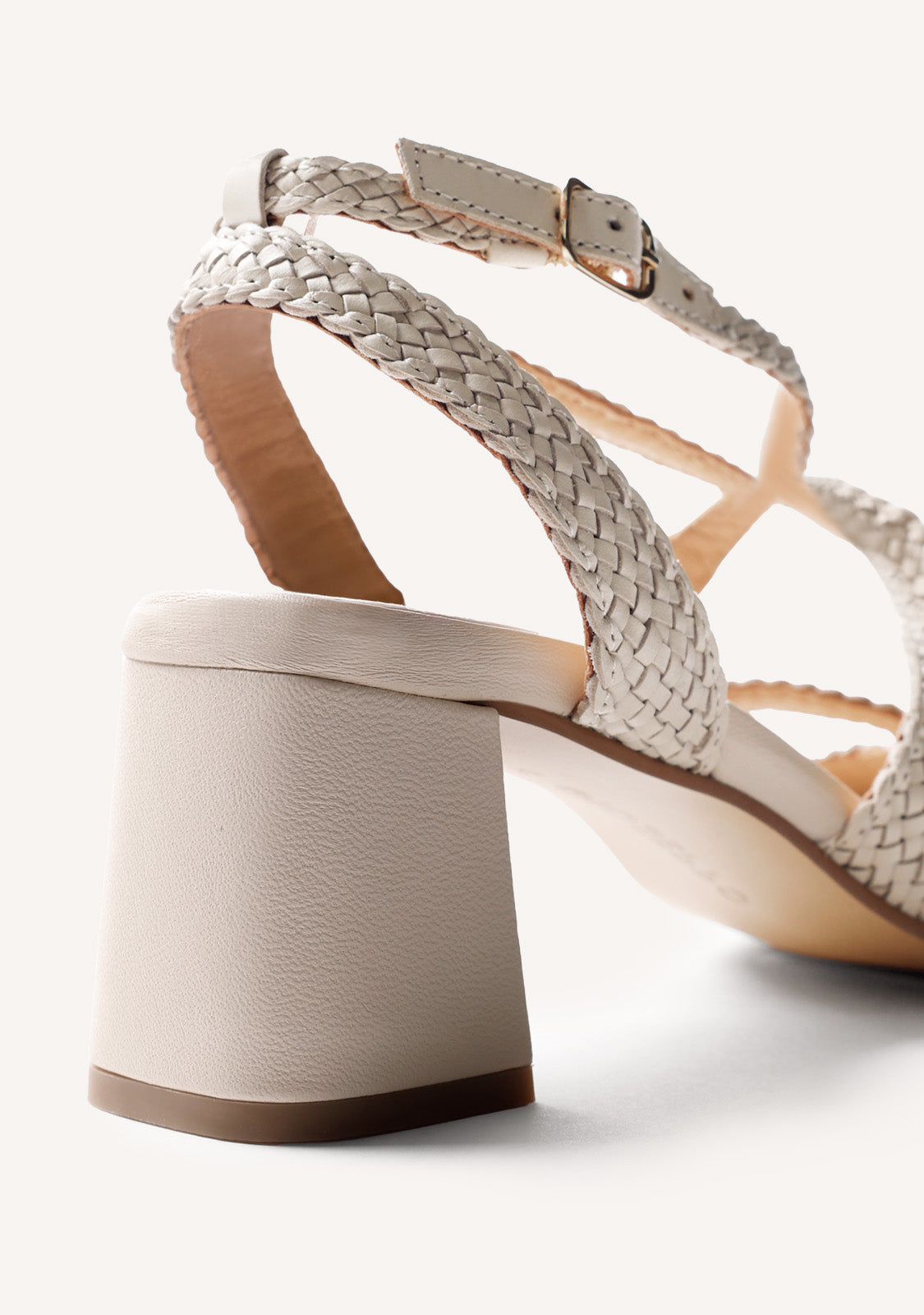 Cream woven heeled sandals with ankle buckle and square toe