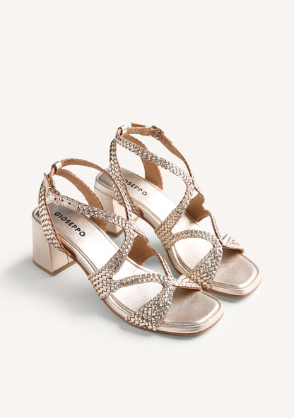 Women's metallic gold woven heeled sandals with ankle buckle straps