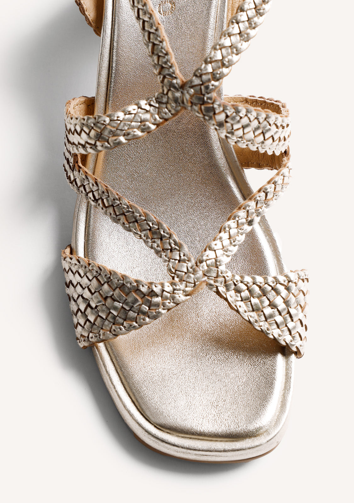 Women's metallic gold woven heeled sandals with ankle buckle straps