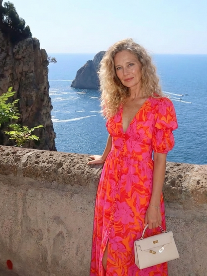 Women's pink floral midi dress with V-neck and short puff sleeves