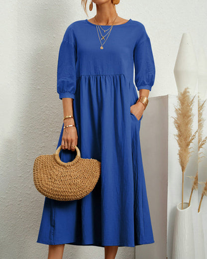 Women's plain A-line midi dress with round neck, 3/4 sleeves and side pockets