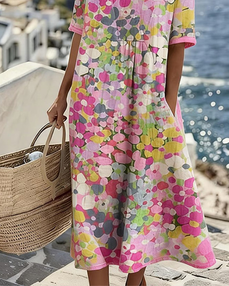 Women's colourful abstract print midi dress with round neckline and 3/4 sleeves