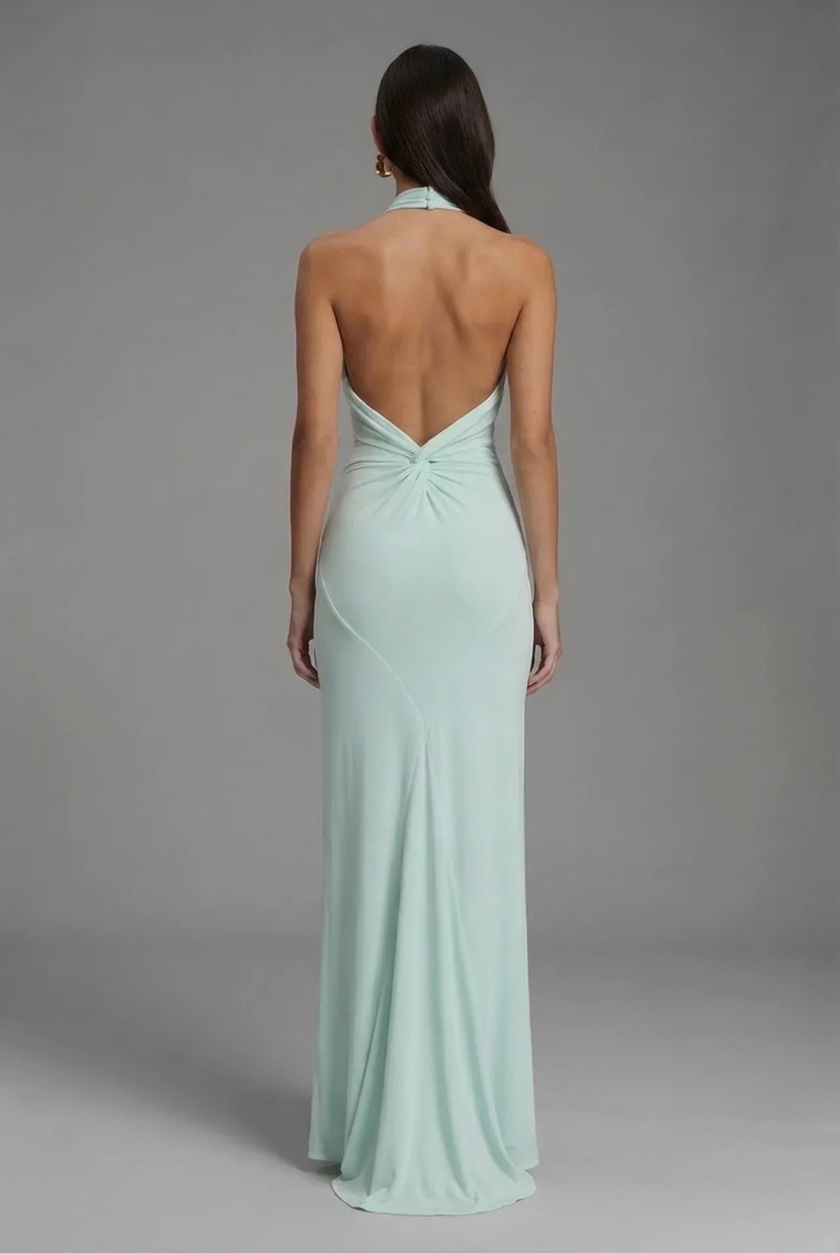 Women's fitted halter maxi dress with gathered ruching and floor-length skirt