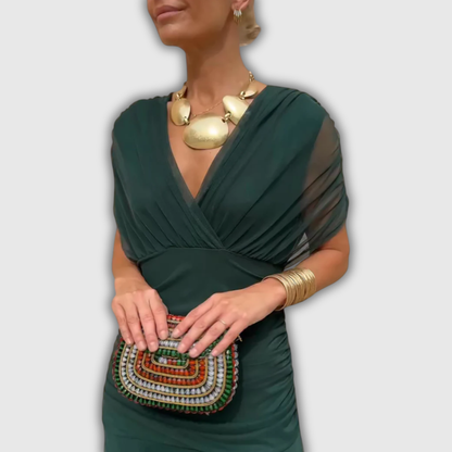Women's wrap maxi dress with V-neckline, short sheer sleeves and ruched sides