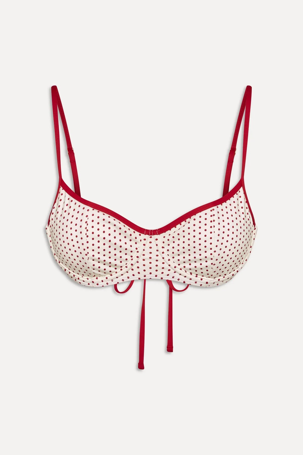 Women's polka dot underwire bikini top with narrow straps and contrast trim