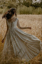 Women's sleeveless lace-up jacquard maxi dress with a fitted corset bodice and flowing skirt