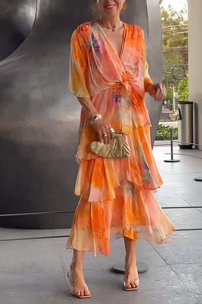 Women's abstract wrap maxi dress with V-neckline, short sleeves and layered ankle-length hem