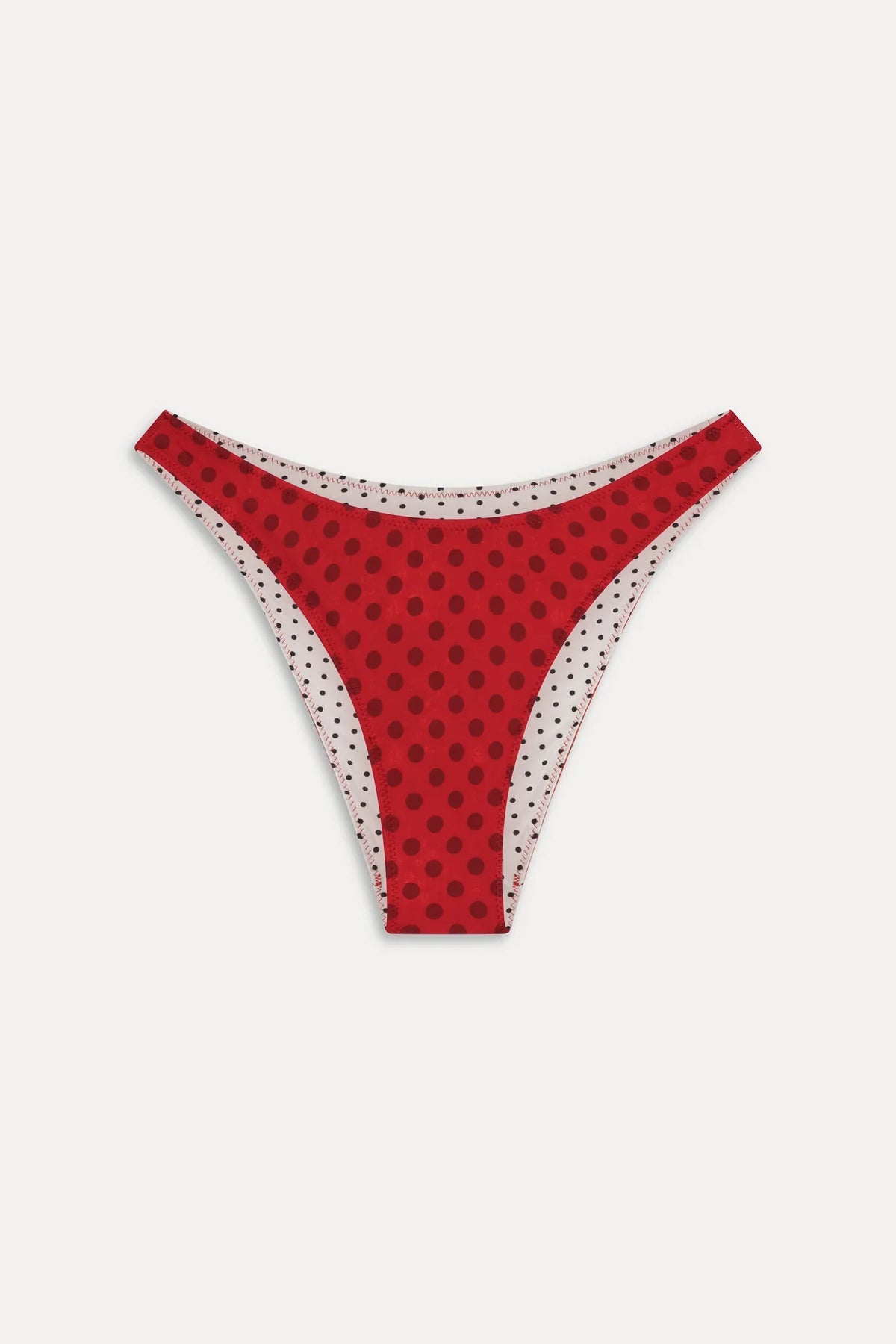 Women's reversible polka dot bikini bottoms with mid-rise brief cut