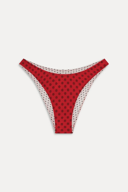 Women's reversible polka dot bikini bottoms with mid-rise brief cut
