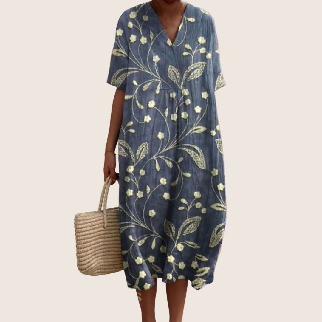 Women's floral V-neck midi dress with short sleeves and button front