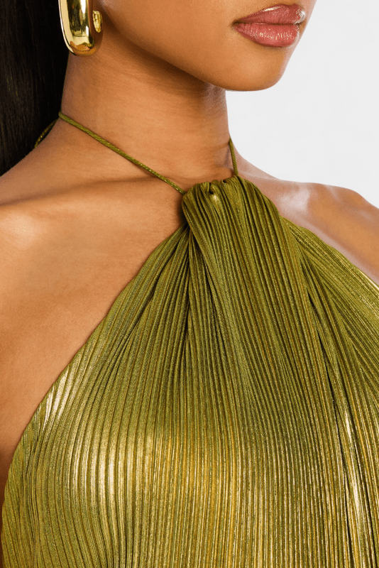 Women's green metallic halter maxi dress with pleated skirt and high side slit