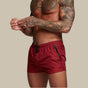 Men's plain swim shorts with elasticated drawstring waist and zipped side pockets
