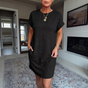 Women's textured short dress with crew neckline, short sleeves and side pockets