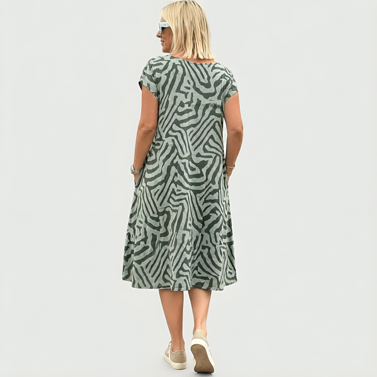 Women's abstract print midi dress with short sleeves and side pockets