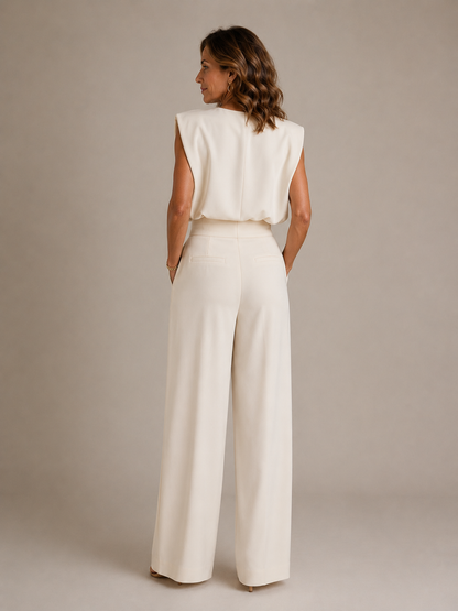 Women's sleeveless wide-leg jumpsuit with pleated high waist and side pockets