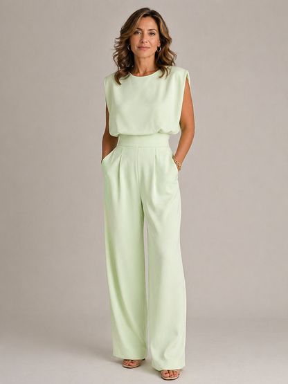 Women's sleeveless wide-leg jumpsuit with pleated high waist and side pockets
