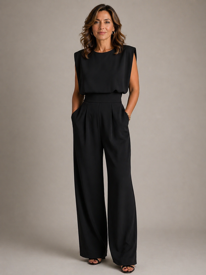 Women's sleeveless wide-leg jumpsuit with pleated high waist and side pockets
