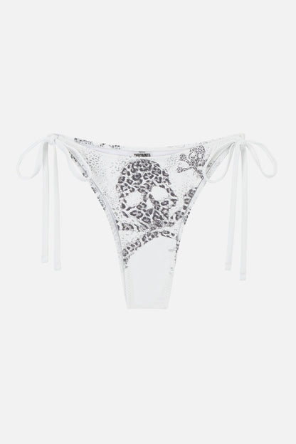 White women's bikini bottoms with black animal print skull graphics and tie sides