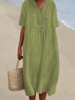 Women's relaxed V-neck midi dress with short sleeves and a gathered waist