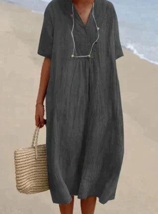 Women's relaxed V-neck midi dress with short sleeves and a gathered waist