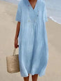 Women's relaxed V-neck midi dress with short sleeves and a gathered waist