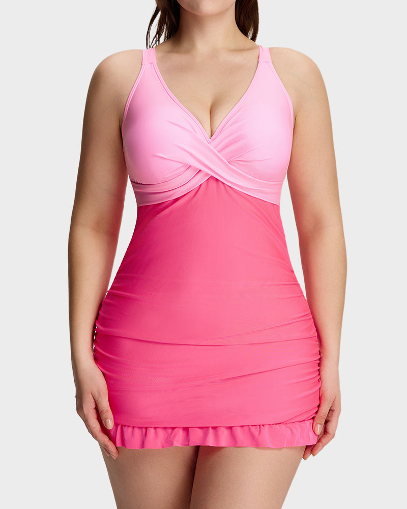 Women's ruched V-neck one-piece swimsuit with cross-back straps and ruffle hem