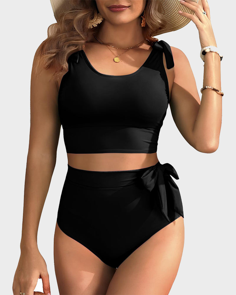 Women's high-waisted bikini set with tie-shoulder crop top and side bow detail