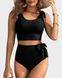 Women's high-waisted bikini set with tie-shoulder crop top and side bow detail