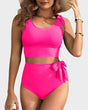 Women's high-waisted bikini set with tie-shoulder crop top and side bow detail