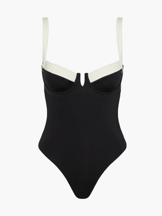 Black one-piece swimsuit with sweetheart neckline, light trim and spaghetti straps