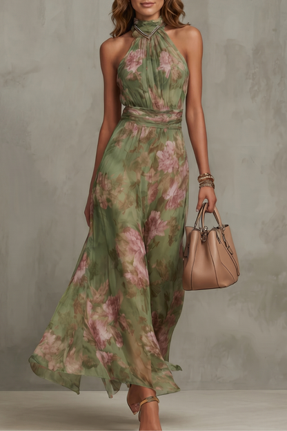 Green floral halter maxi dress with waist sash and flowing skirt