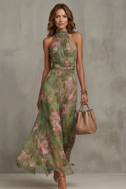 Green floral halter maxi dress with waist sash and flowing skirt