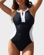 Women's halter-neck one-piece swimsuit with front zip and contrast panels