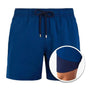 Men's plain mid-length swim shorts with elasticated drawstring waist and side pockets