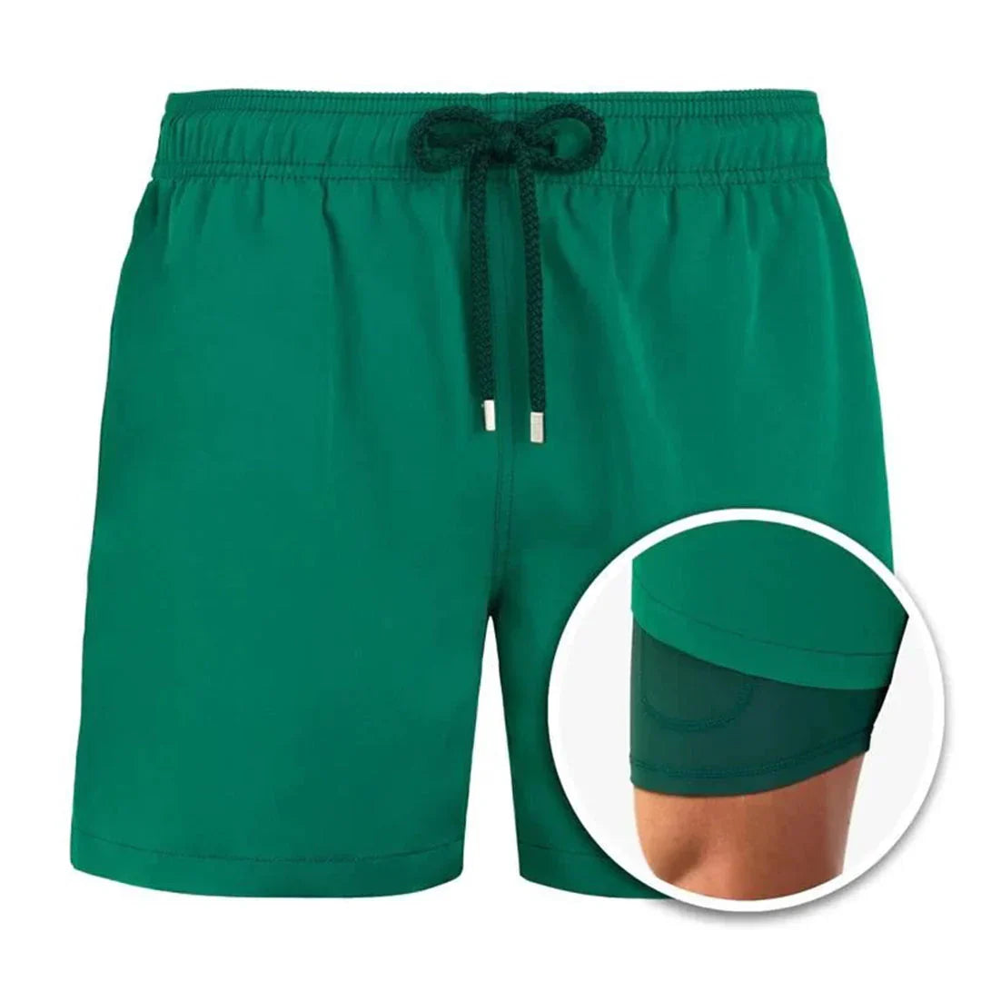 Men's plain mid-length swim shorts with elasticated drawstring waist and side pockets