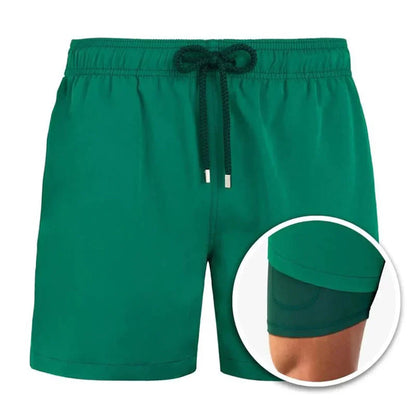 Men's plain mid-length swim shorts with elasticated drawstring waist and side pockets