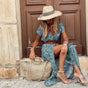 Women's blue paisley wrap maxi dress with short sleeves and high side split