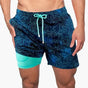 Men's tropical print swim shorts with drawstring waist and inner compression shorts