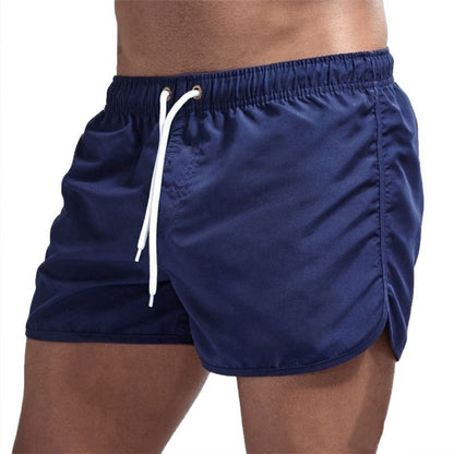 Men's plain swim shorts with elasticated waistband and drawstring