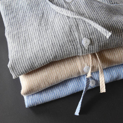 Men's striped long-sleeve hooded shirt with button front and curved hem