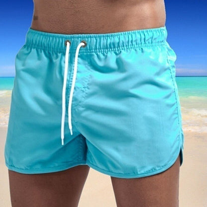Men's plain swim shorts with elasticated waistband and drawstring