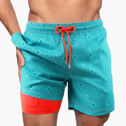 Men's tropical print swim shorts with drawstring waist and inner compression shorts