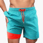 Men's tropical print swim shorts with drawstring waist and inner compression shorts